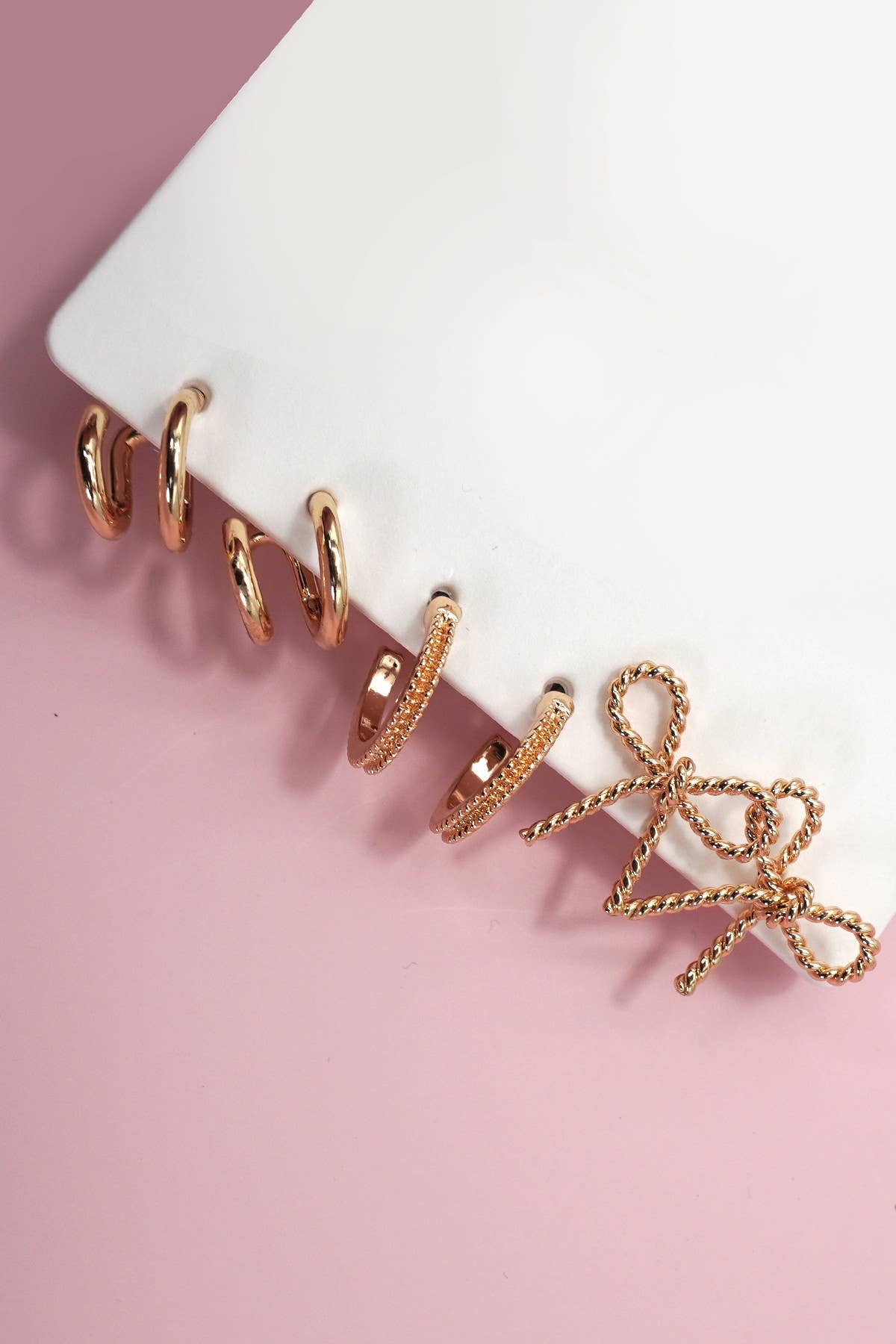TRIO HUGGIE BOW HOOP TITANIUM POST EARRINGS | 80E06205: Gold